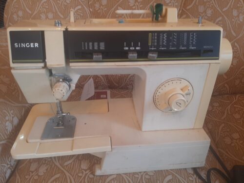 Máquina de costura portátil Singer